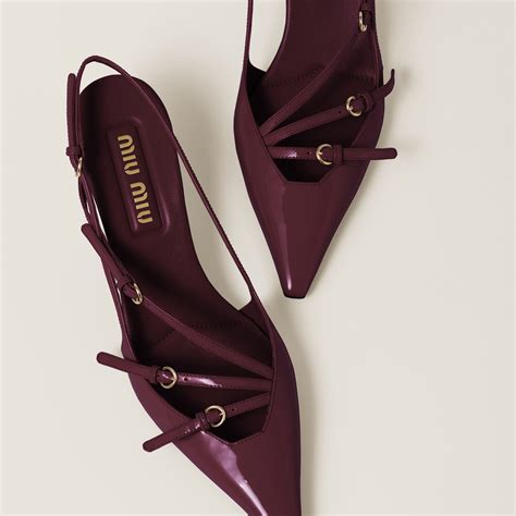 Crimson Patent Leather Slingbacks With Buckles.